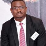 Dr John Spire Kiggundu