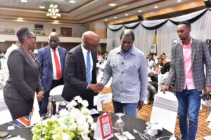 04 Claver Serumaga- Executive Director at Equity Bank Uganda welcoming Pastor Robert Kayanja at the Tupange Business Ne Equity 2025 Forum