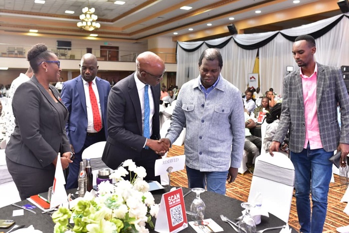 04 Claver Serumaga- Executive Director at Equity Bank Uganda welcoming Pastor Robert Kayanja at the Tupange Business Ne Equity 2025 Forum