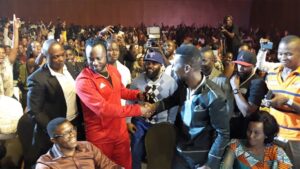 Bobby Wne and Bebe Cool shake hands