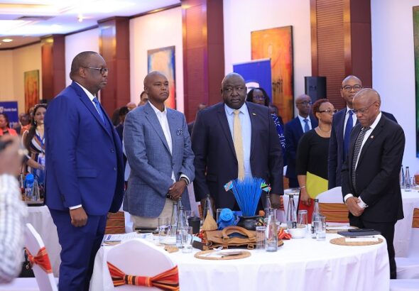 Stanbic Bank's Mumba Kalifungwa, Patrick Mweheire, Damoni Kitabire and the State Minister of Foreign Affairs Hon. Hillary Okello Oryem during th