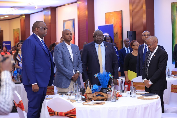 Stanbic Bank's Mumba Kalifungwa, Patrick Mweheire, Damoni Kitabire and the State Minister of Foreign Affairs Hon. Hillary Okello Oryem during th