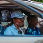 Berna Musanabera inside her brand new car