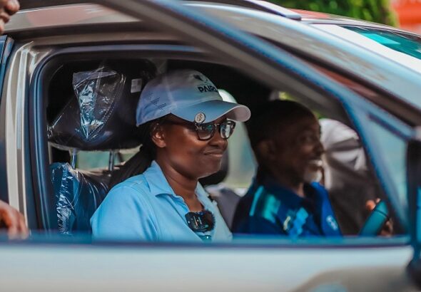 Berna Musanabera inside her brand new car