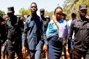 Bobi wine flees home