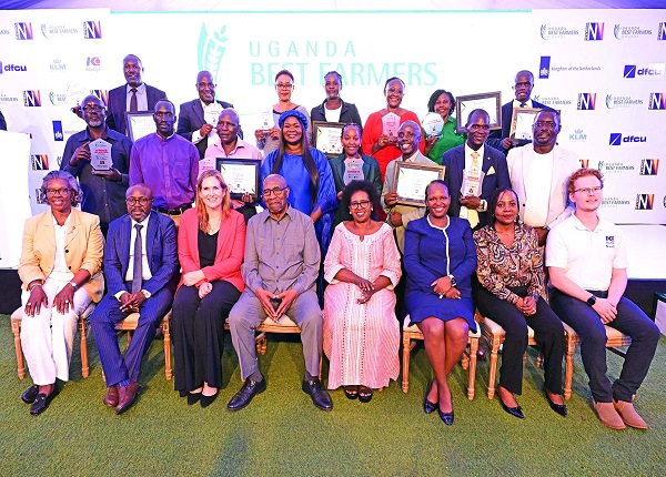 dfcu winners with the chief guest and sponsors (30).jpg