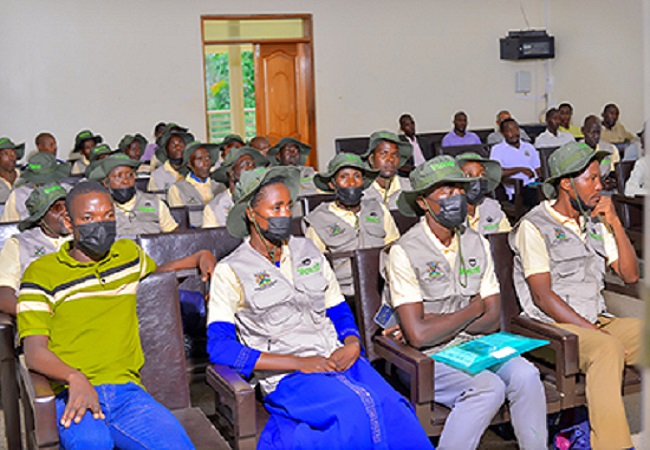 ECOTRUST Photo of model farmers who have excelled in the project during the meeting.
